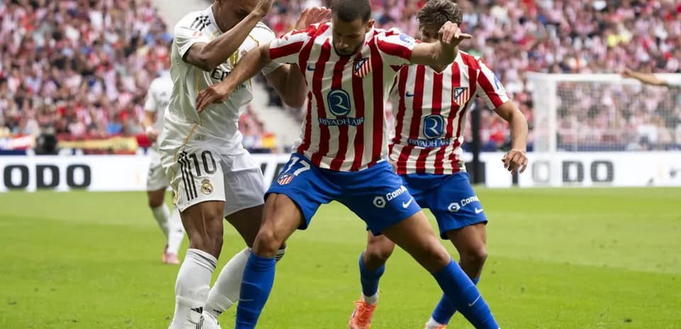 Real Madrid and Atletico Madrid players in action