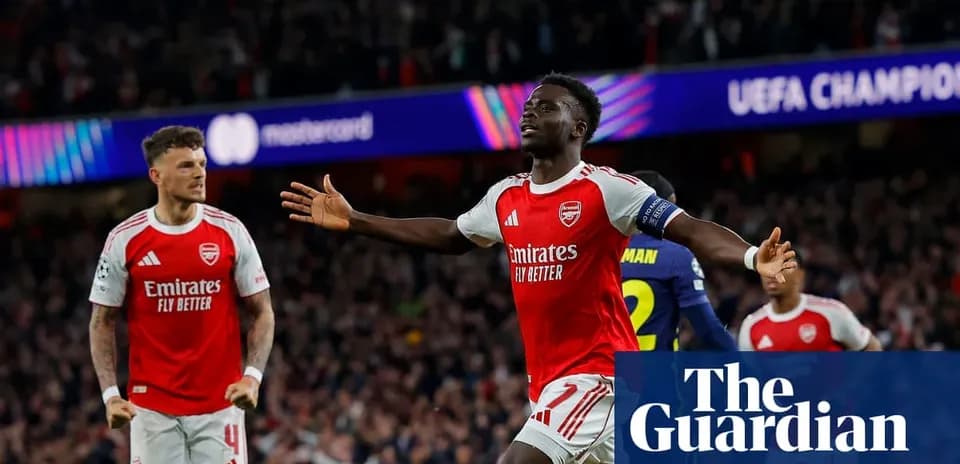 Arsenal players celebrating a goal during UEFA Champions League