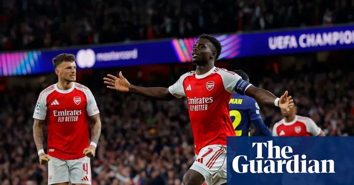 Arsenal players celebrating a goal during UEFA Champions League