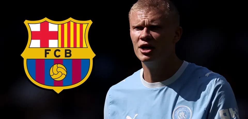Player in Manchester City kit with FC Barcelona logo