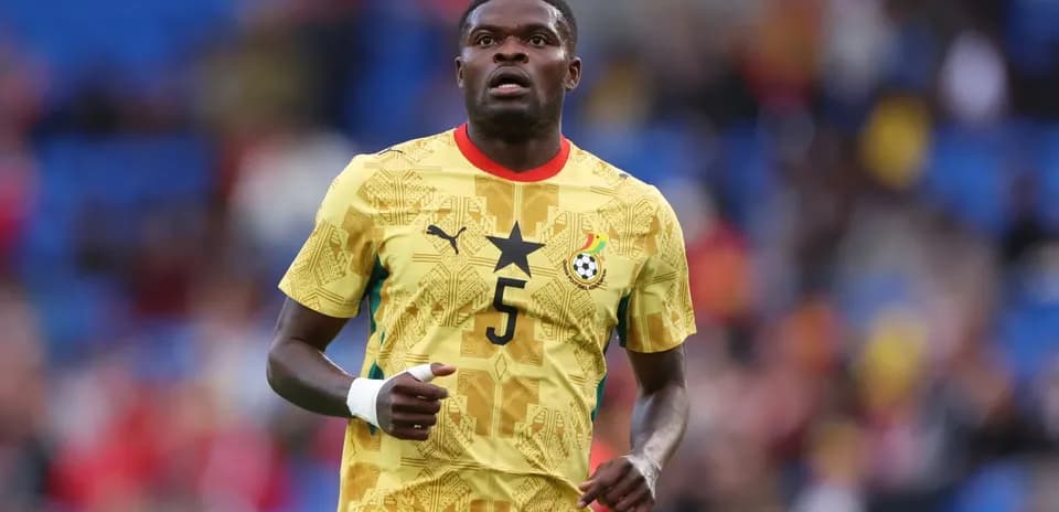 Player wearing Ghana national team jersey on field
