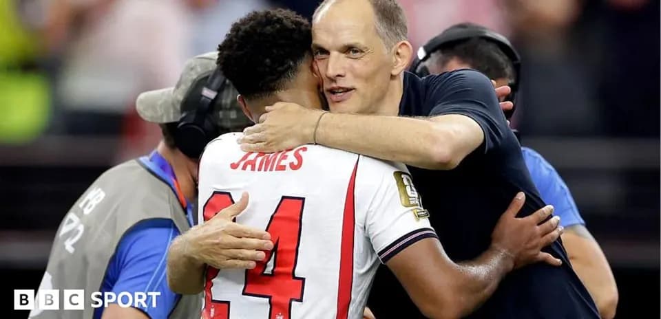 Player and coach embracing after the match