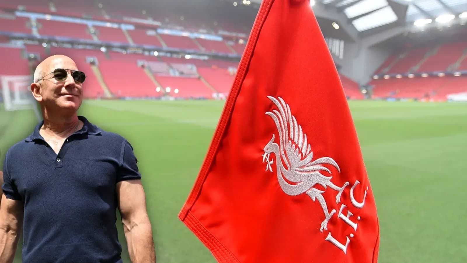 Person standing beside Liverpool FC corner flag at stadium