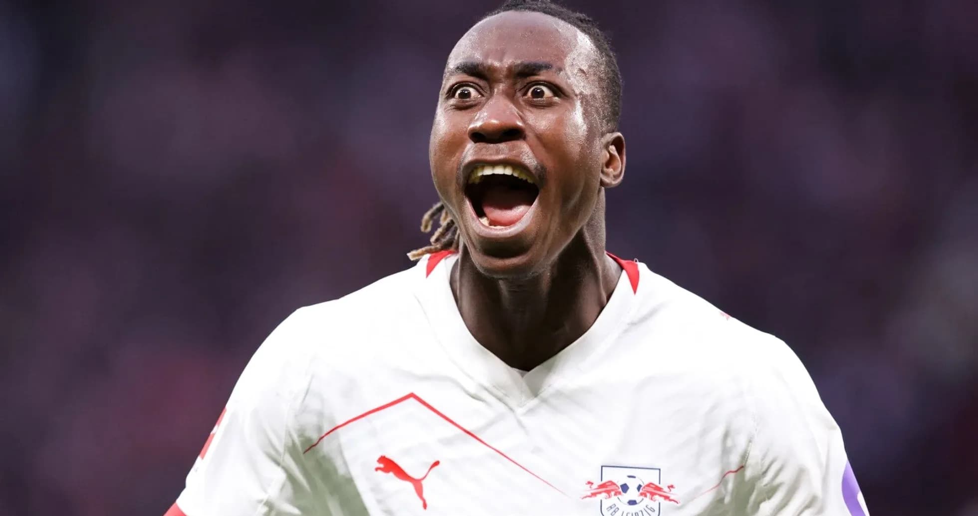 Player celebrating a goal on the field