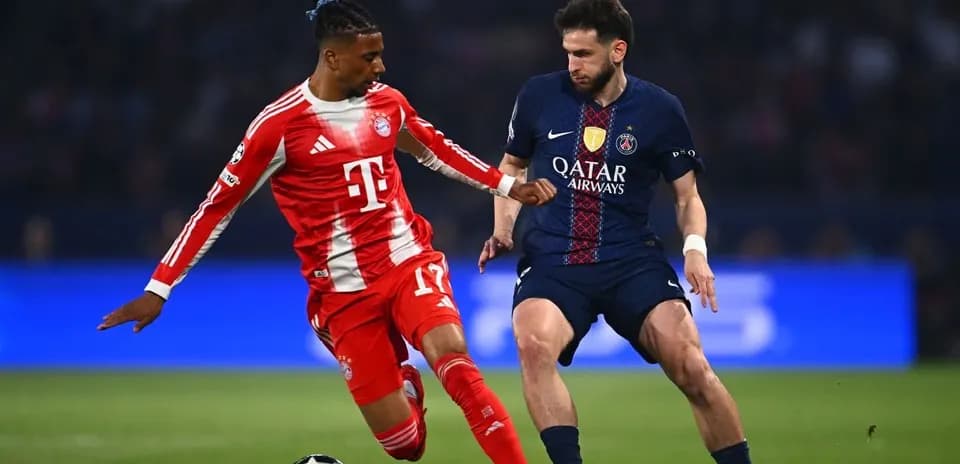 Players battling for the ball during UEFA match