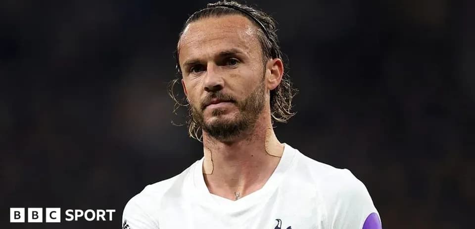 Football player wearing Tottenham jersey during match
