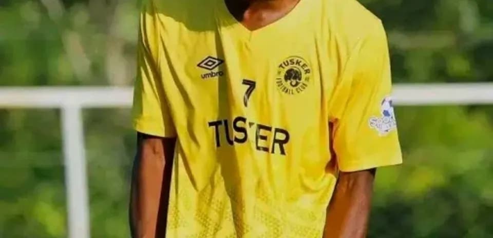 Player celebrating in yellow team jersey