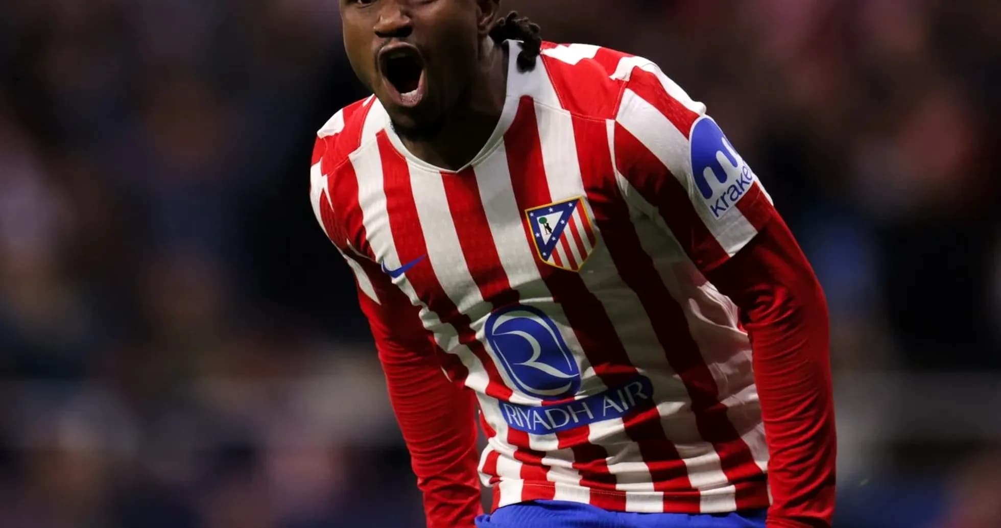 Player celebrating after scoring for Atlético Madrid
