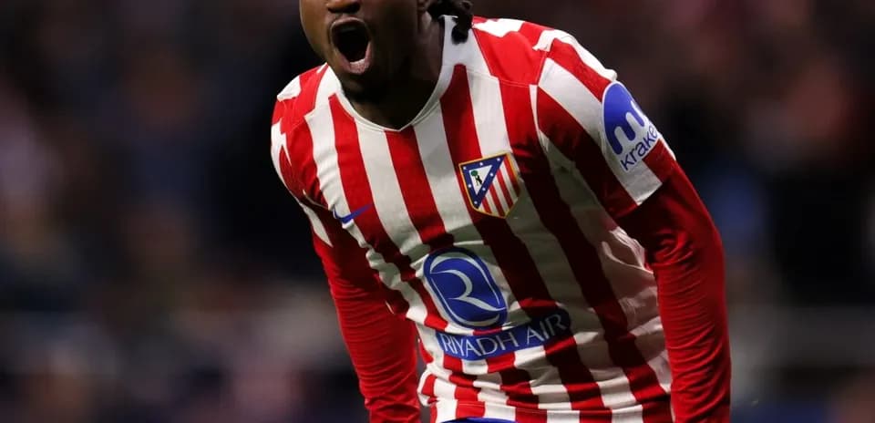 Player celebrating after scoring for Atlético Madrid