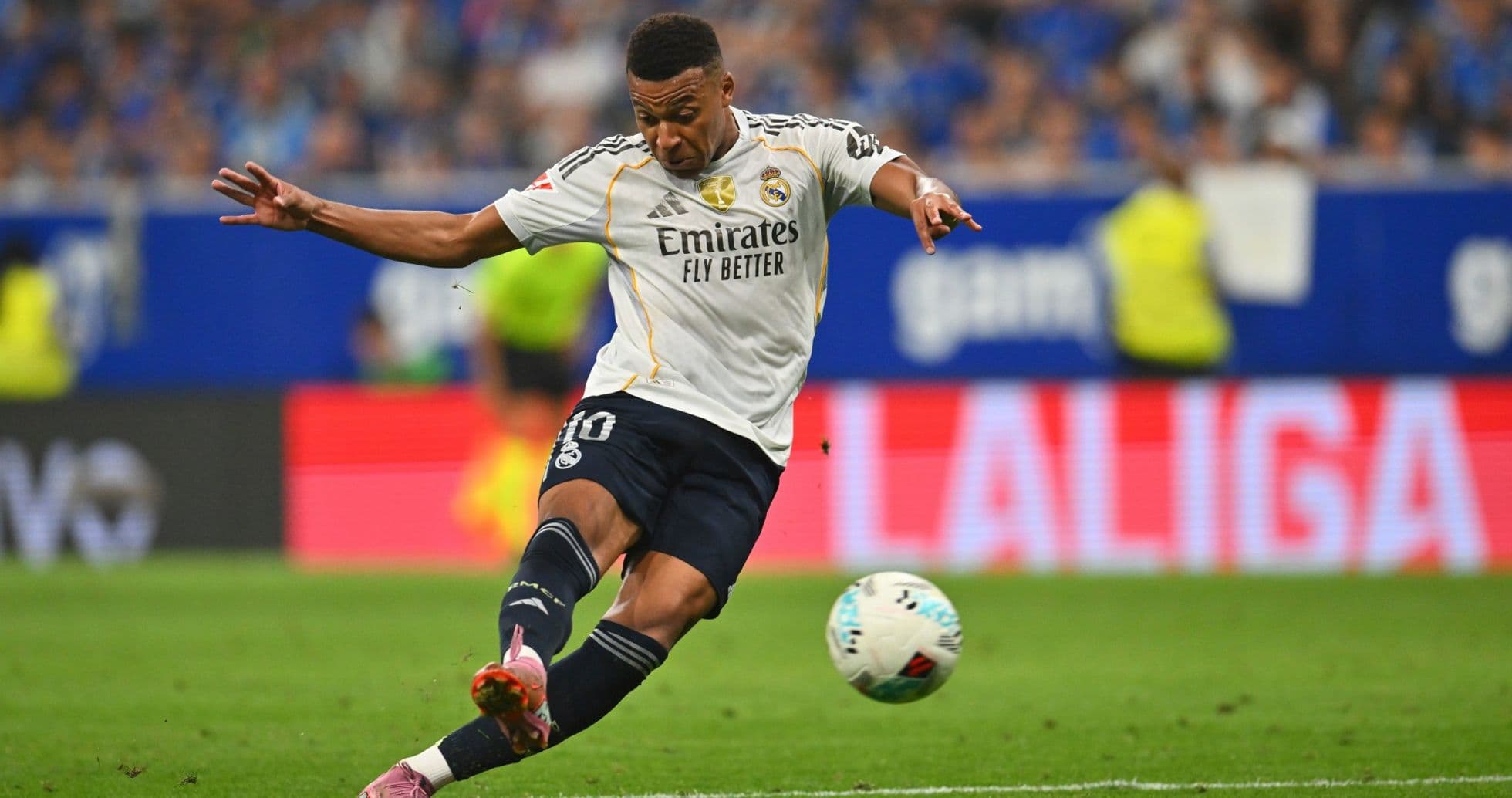 Player from Real Madrid kicking the ball