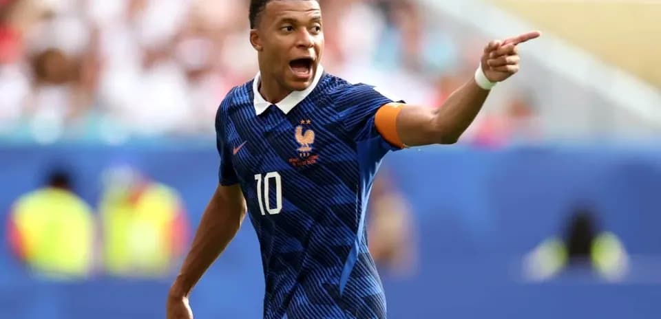 Player directing teammates during a football match