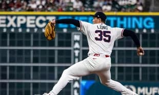 Pitcher throwing during a baseball game