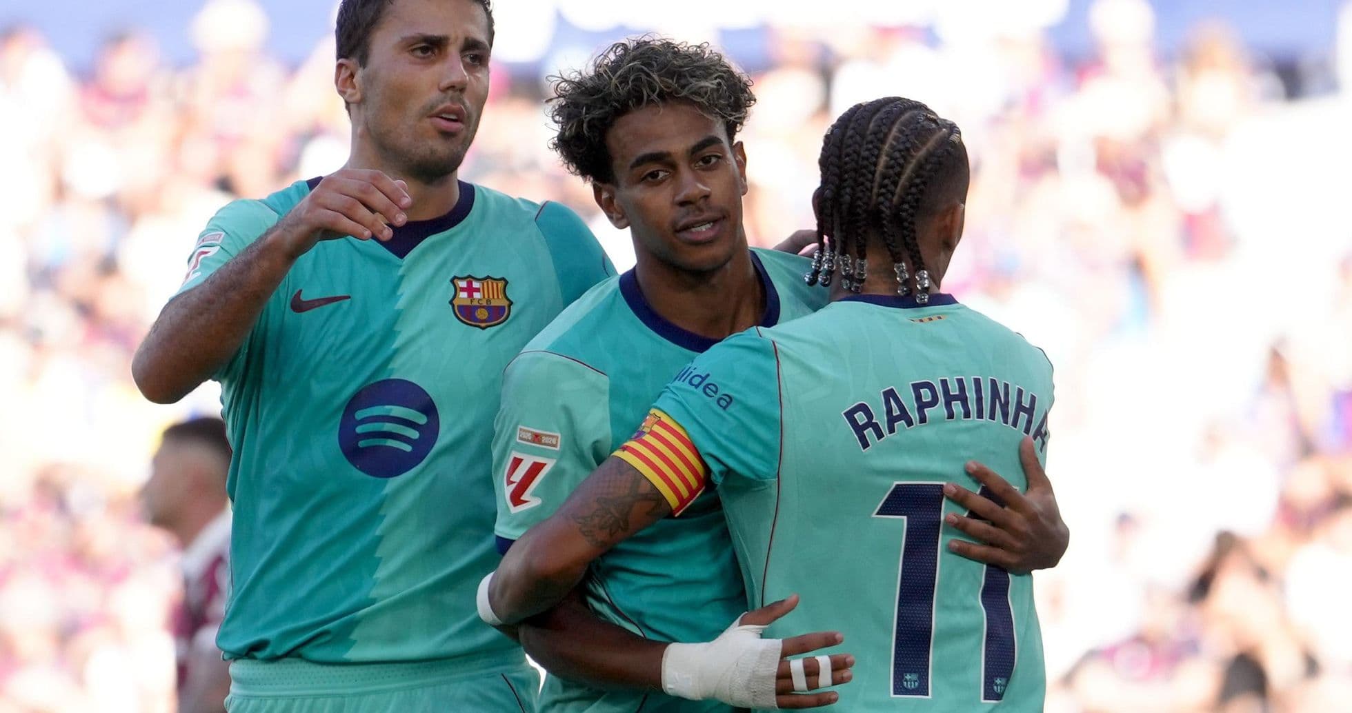 Barcelona players celebrating a goal during match