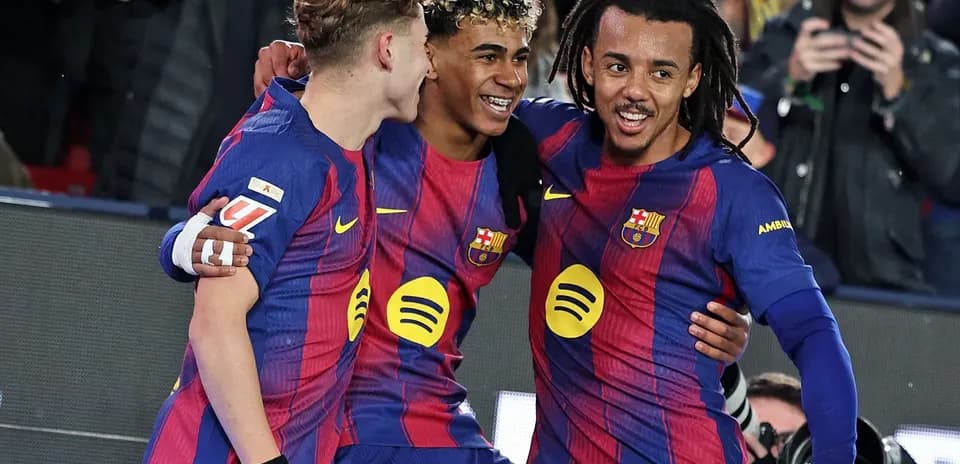 Three FC Barcelona players celebrating a goal