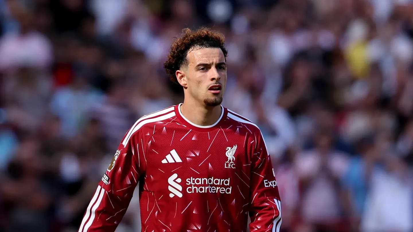Player in Liverpool kit during match action