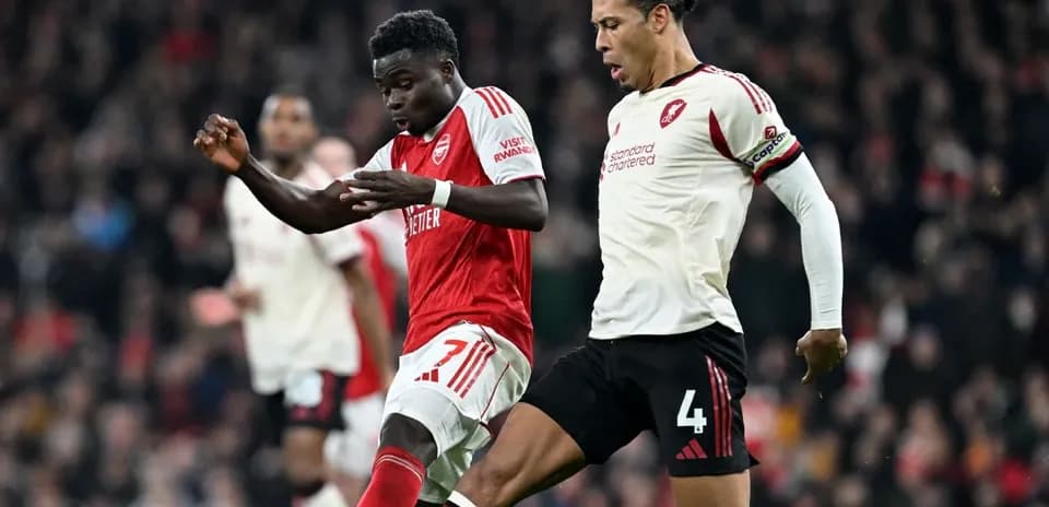 Arsenal and Liverpool players in action