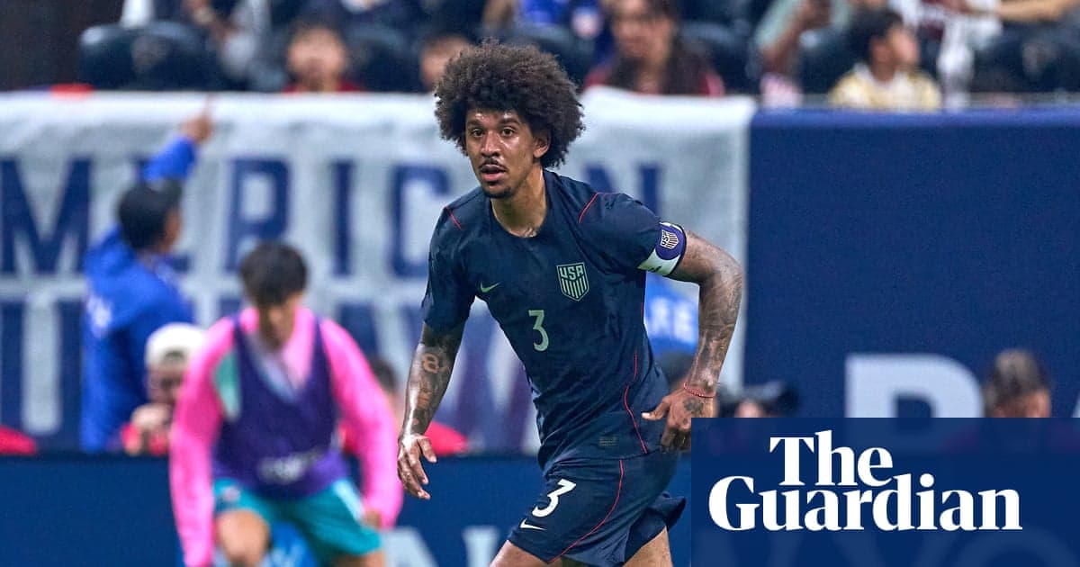 Player in USA jersey running during soccer match