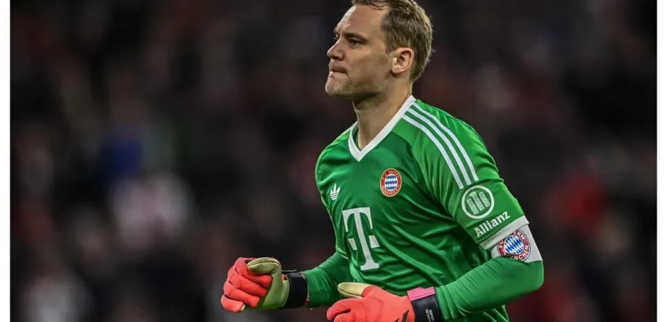 Goalkeeper in green kit running on the pitch