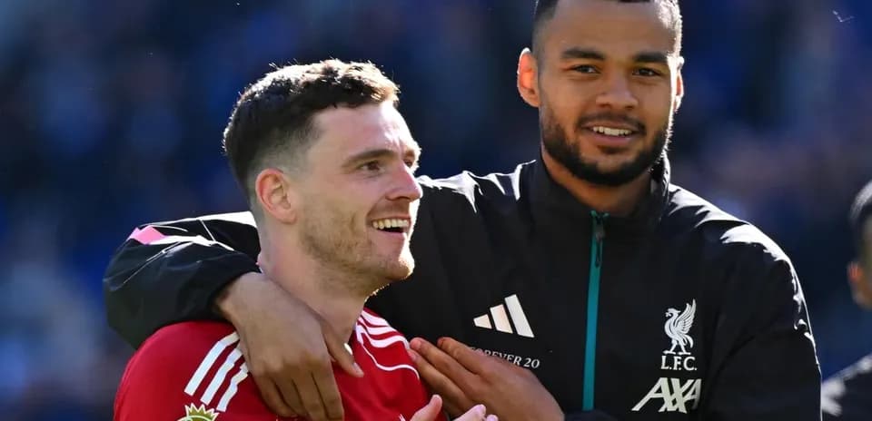 Two Liverpool players celebrating together after match