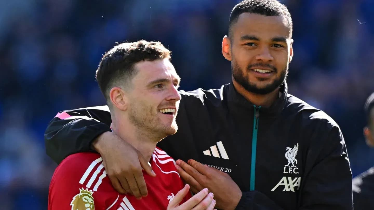 Two Liverpool players celebrating together after match