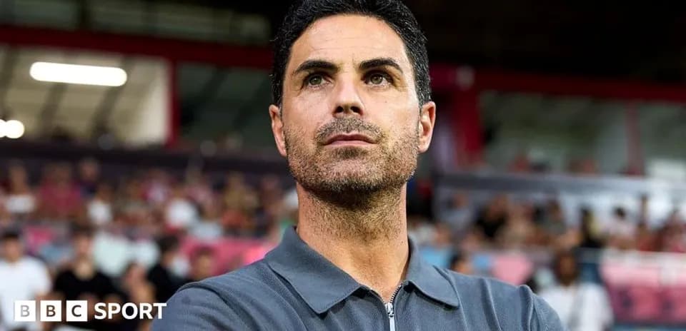 Coach observing the match from the sidelines