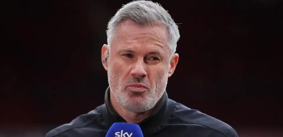 Sports analyst speaking into microphone on set