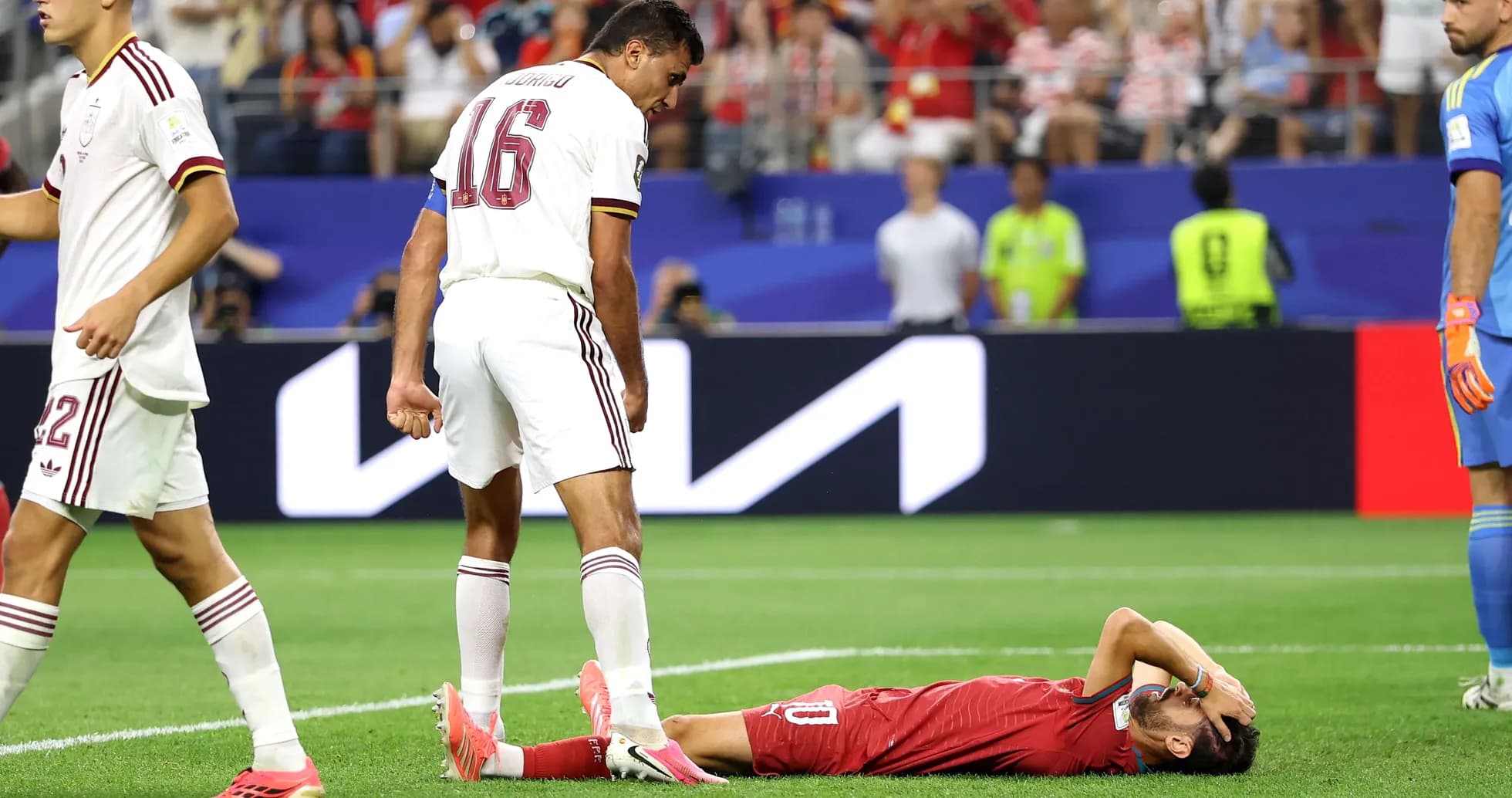 Player lying on the ground during match action
