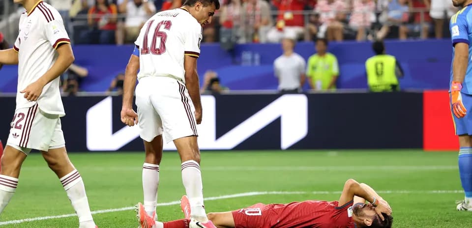 Player lying on the ground during match action