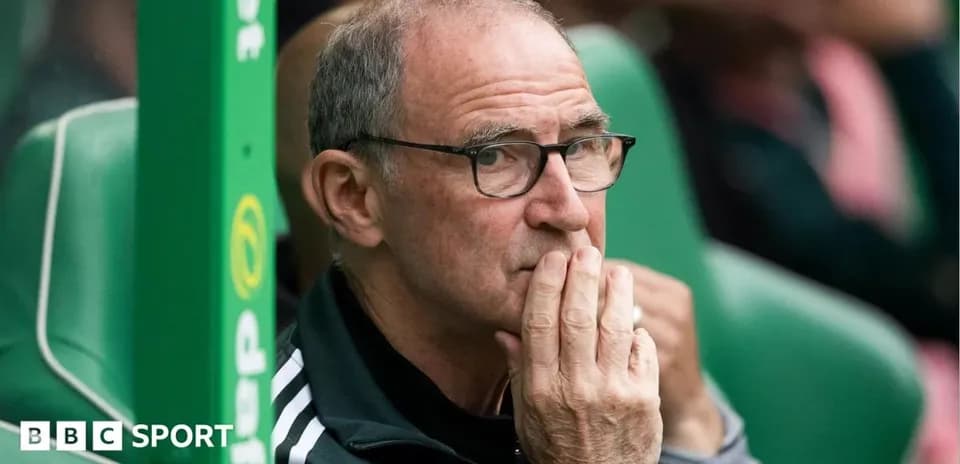 Coach observing the match from the bench