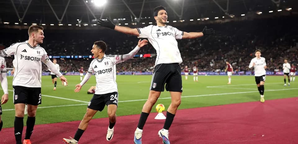 Fulham players celebrating a goal during match