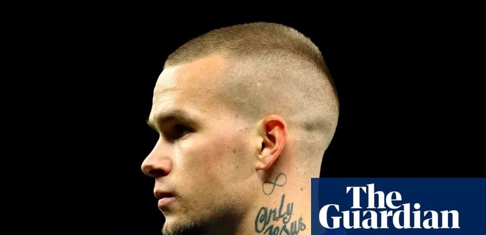 Profile of a player with a short haircut