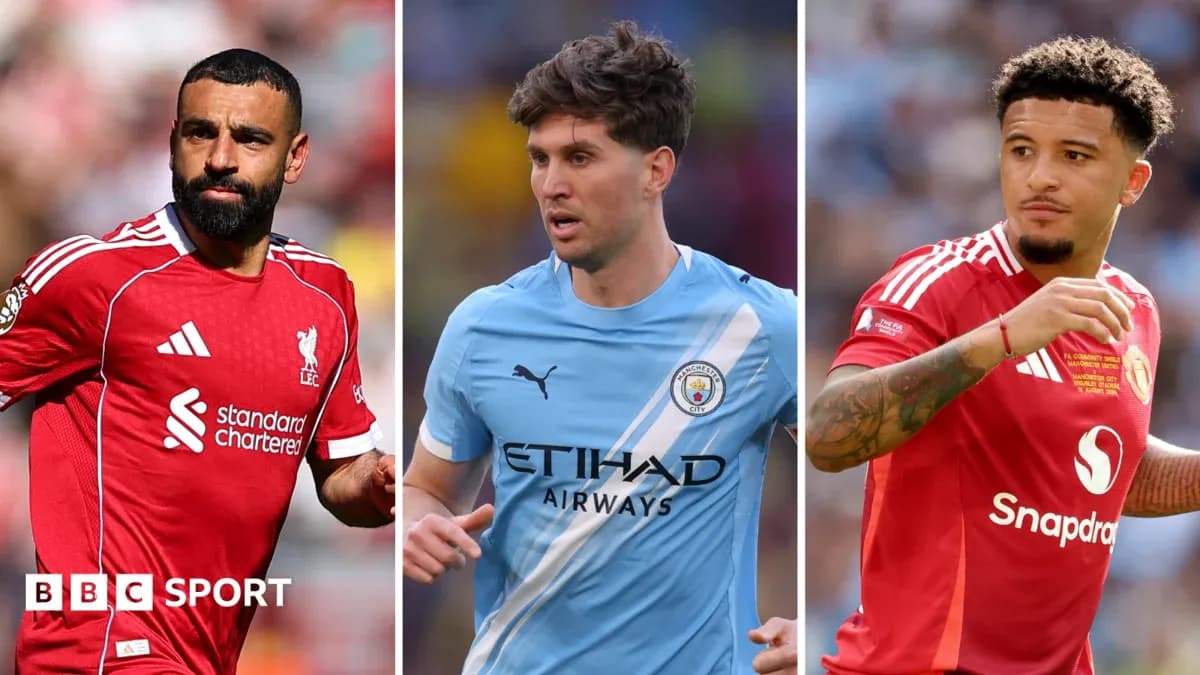 Three football players in their team kits