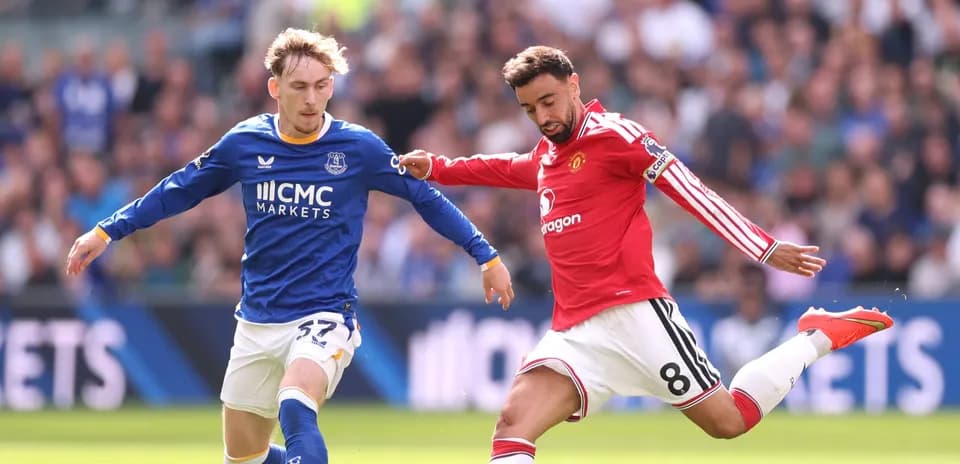 Everton and Manchester United players contesting for the ball