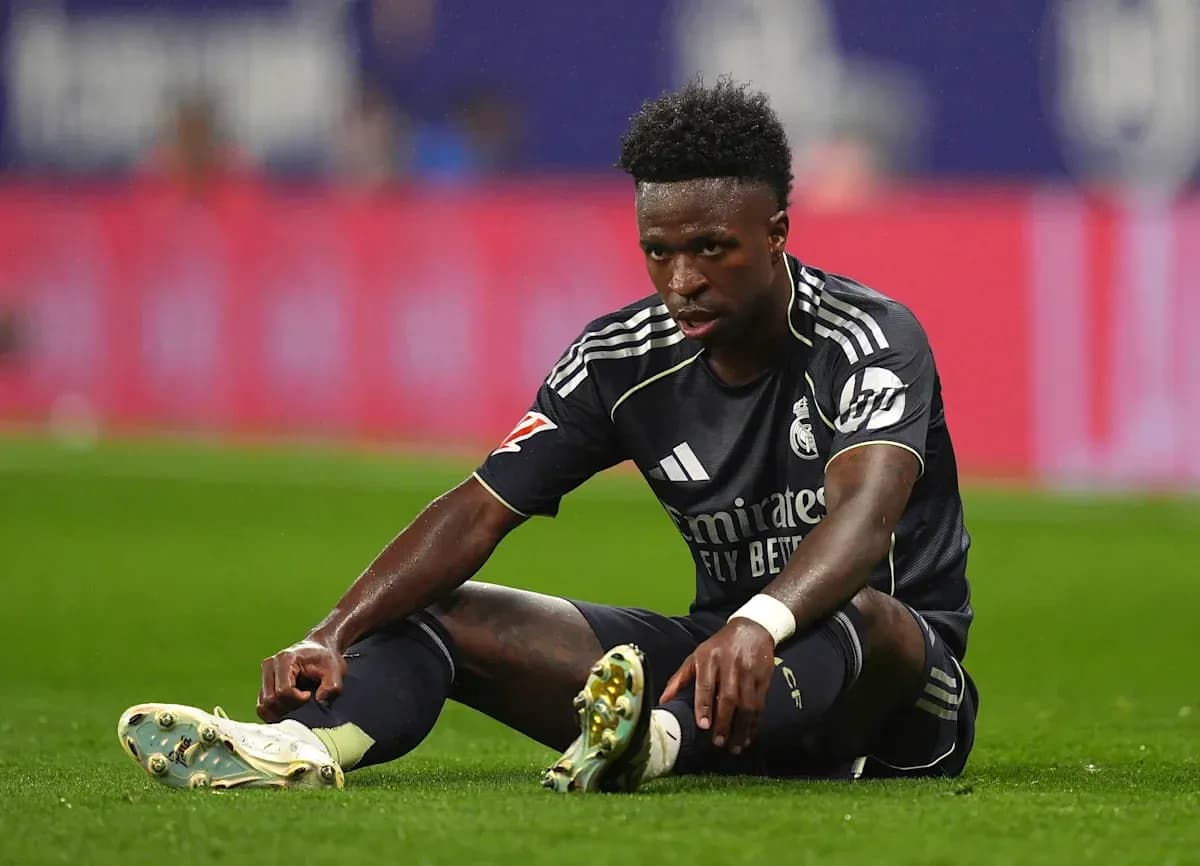 Player sitting on pitch after falling during match