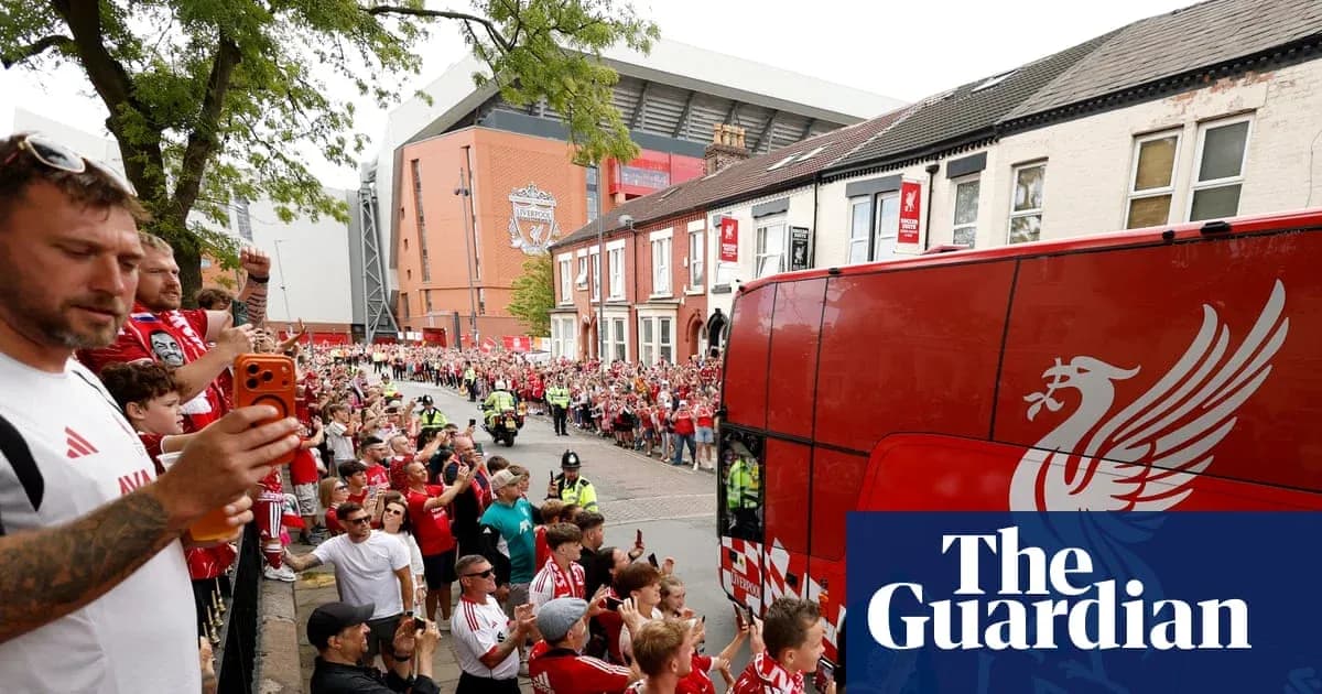 Liverpool fans welcoming team bus outside Anfield