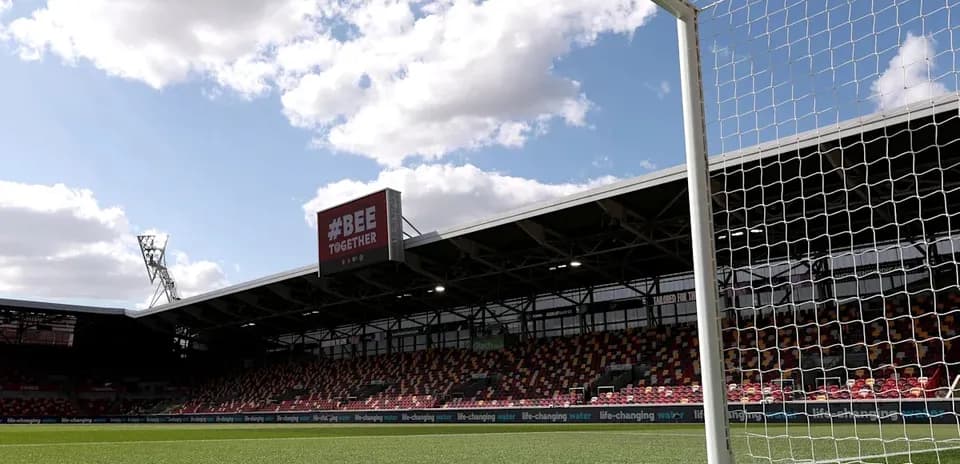 View of football goal and stadium stands