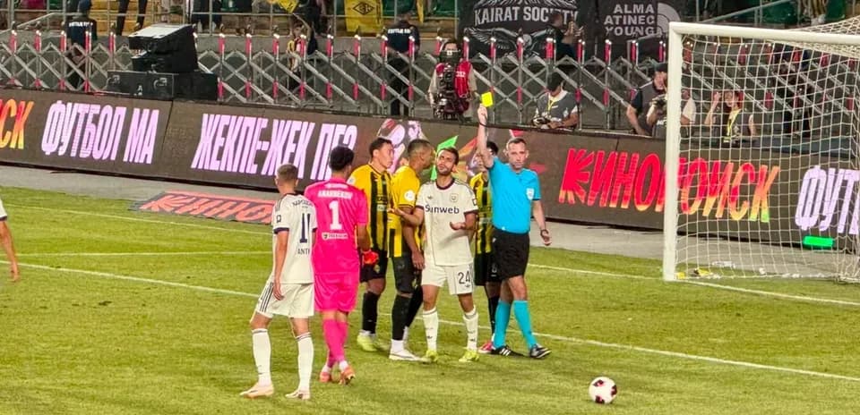 Players and referee during Kairat Almaty match