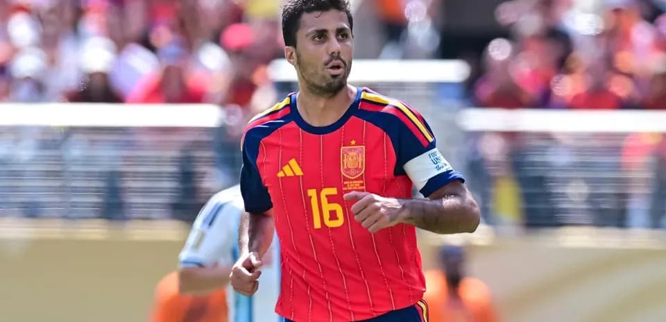 Player in red Spain jersey during match action