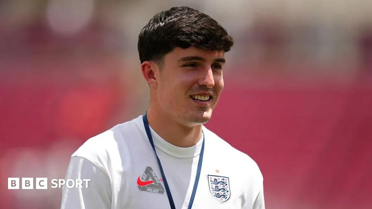 Player in England training kit smiling during warm-up Player in England training kit smiling during warm-up
