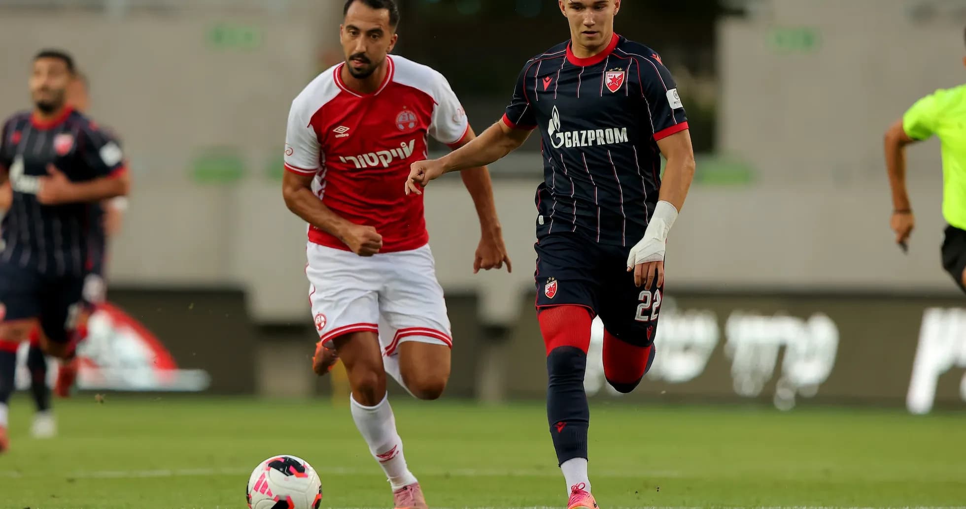 Crvena Zvezda player dribbling past opponent