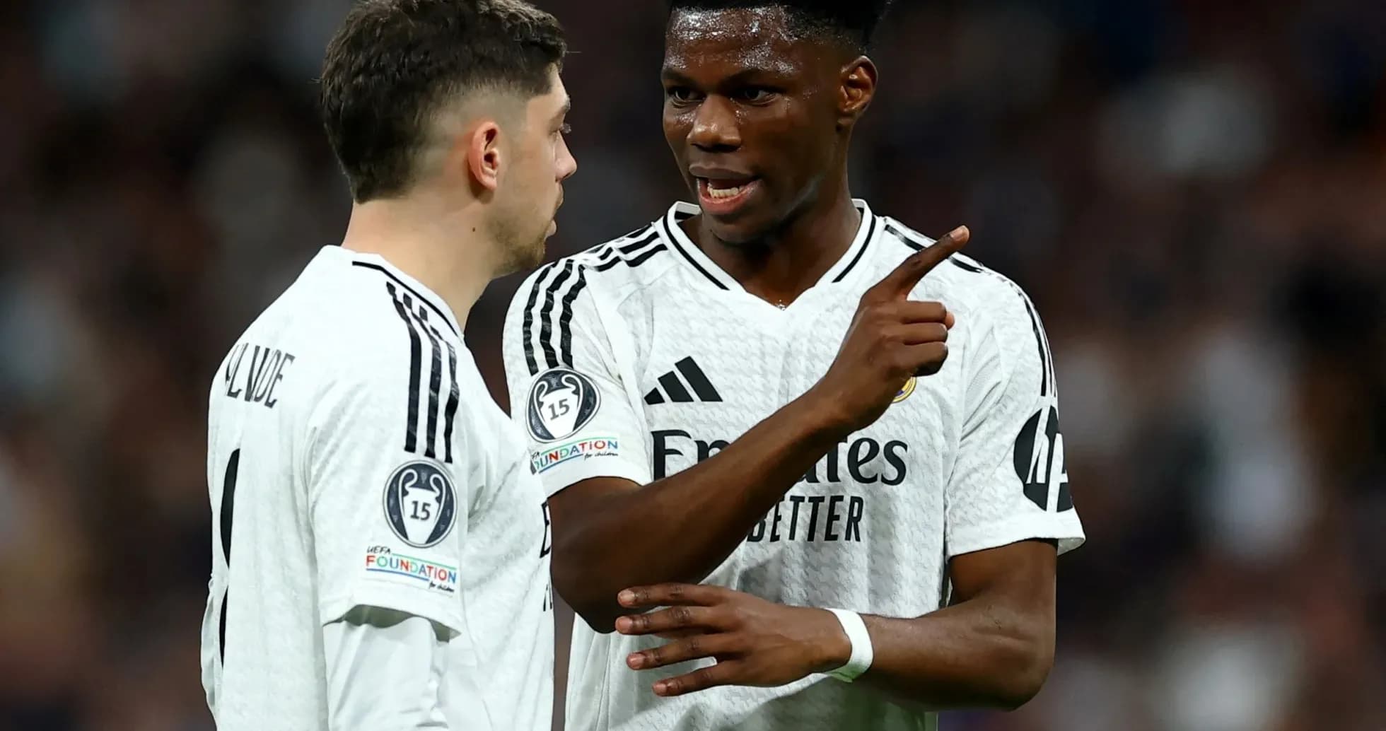 Two Real Madrid players discussing during match