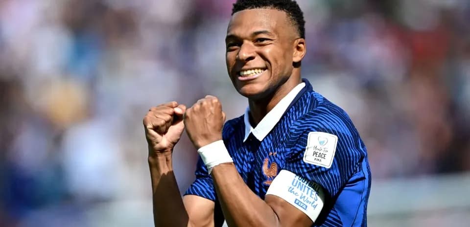 Kylian Mbappé celebrating during a football match