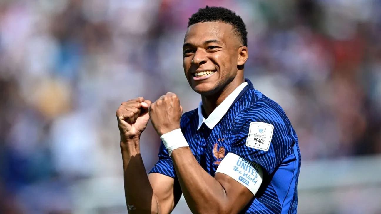 Kylian Mbappé celebrating during a football match