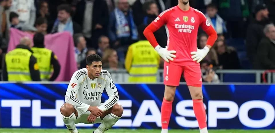 Real Madrid players reacting on the field after match