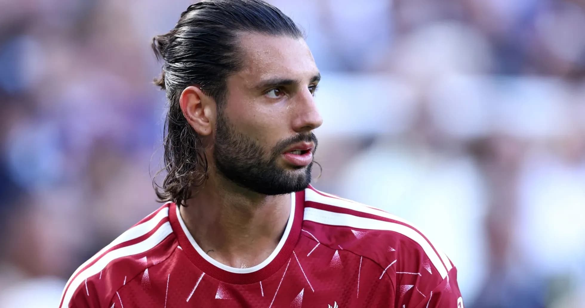 Player in red Liverpool kit during match