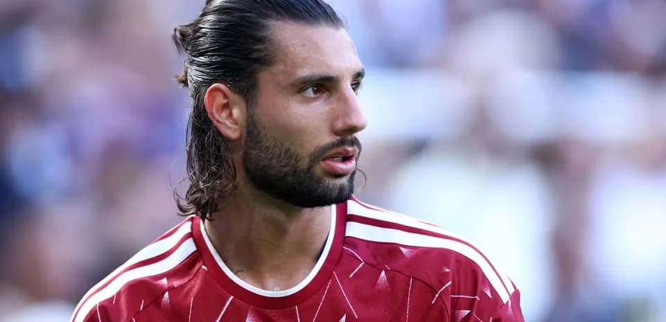 Player in red Liverpool kit during match