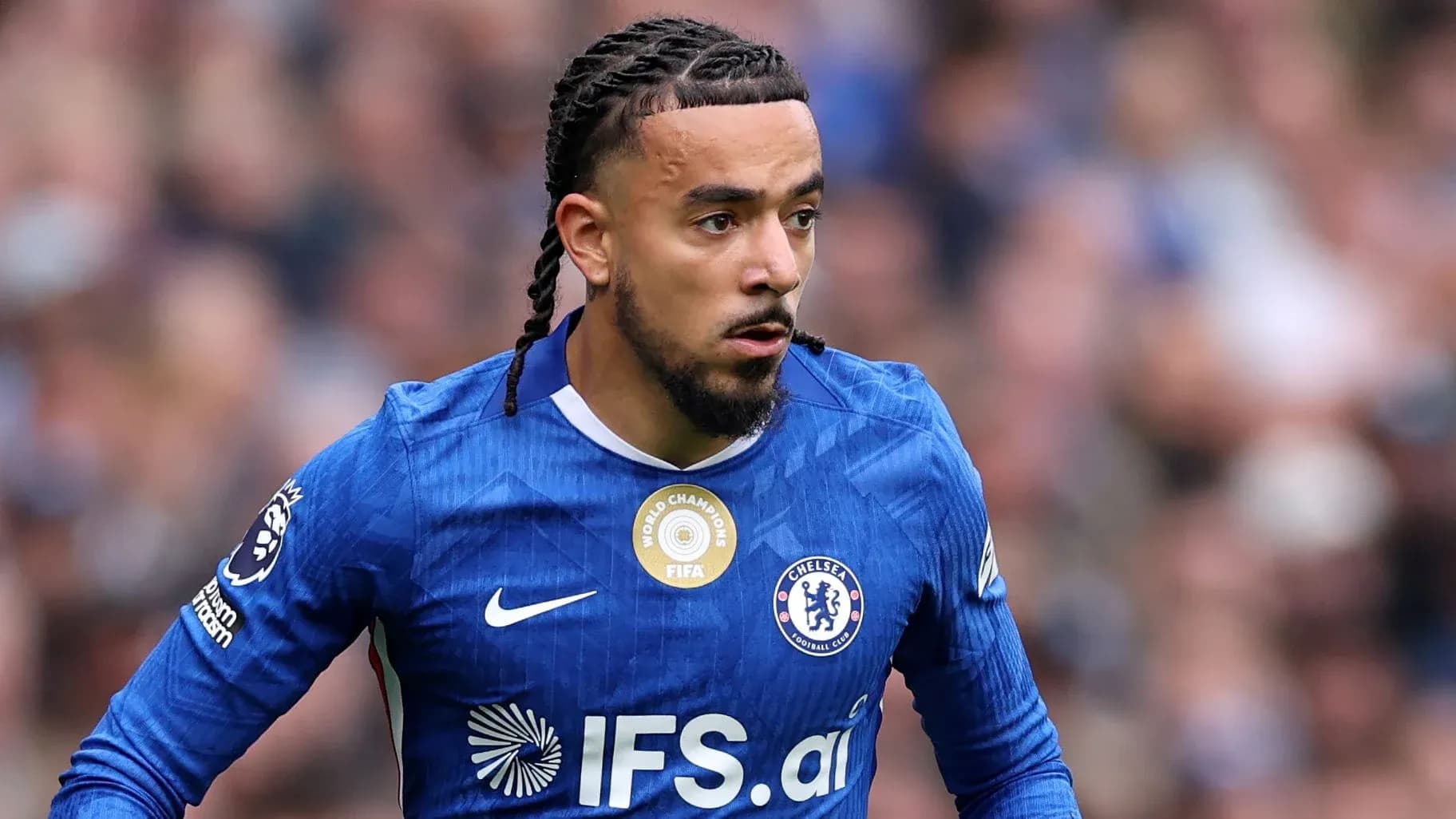 Player in blue Chelsea jersey during match action
