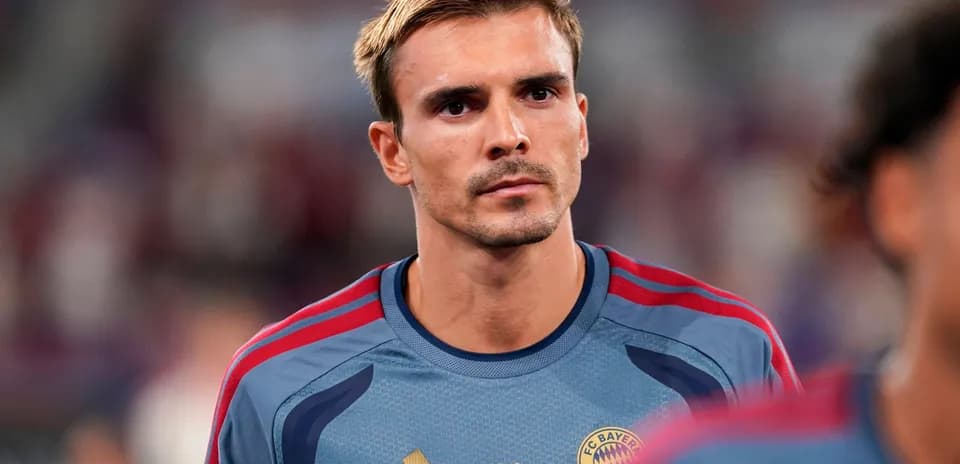 Player in Bayern Munich training kit during warm-up