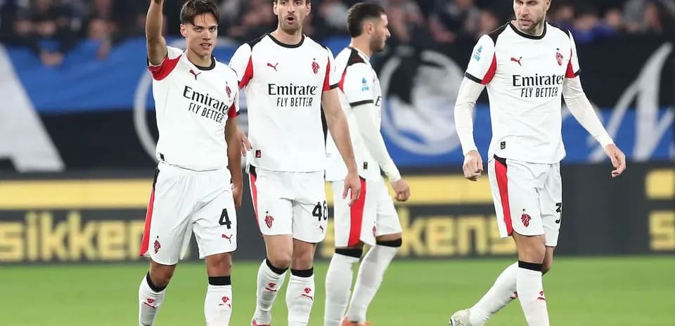 AC Milan players celebrating during a match