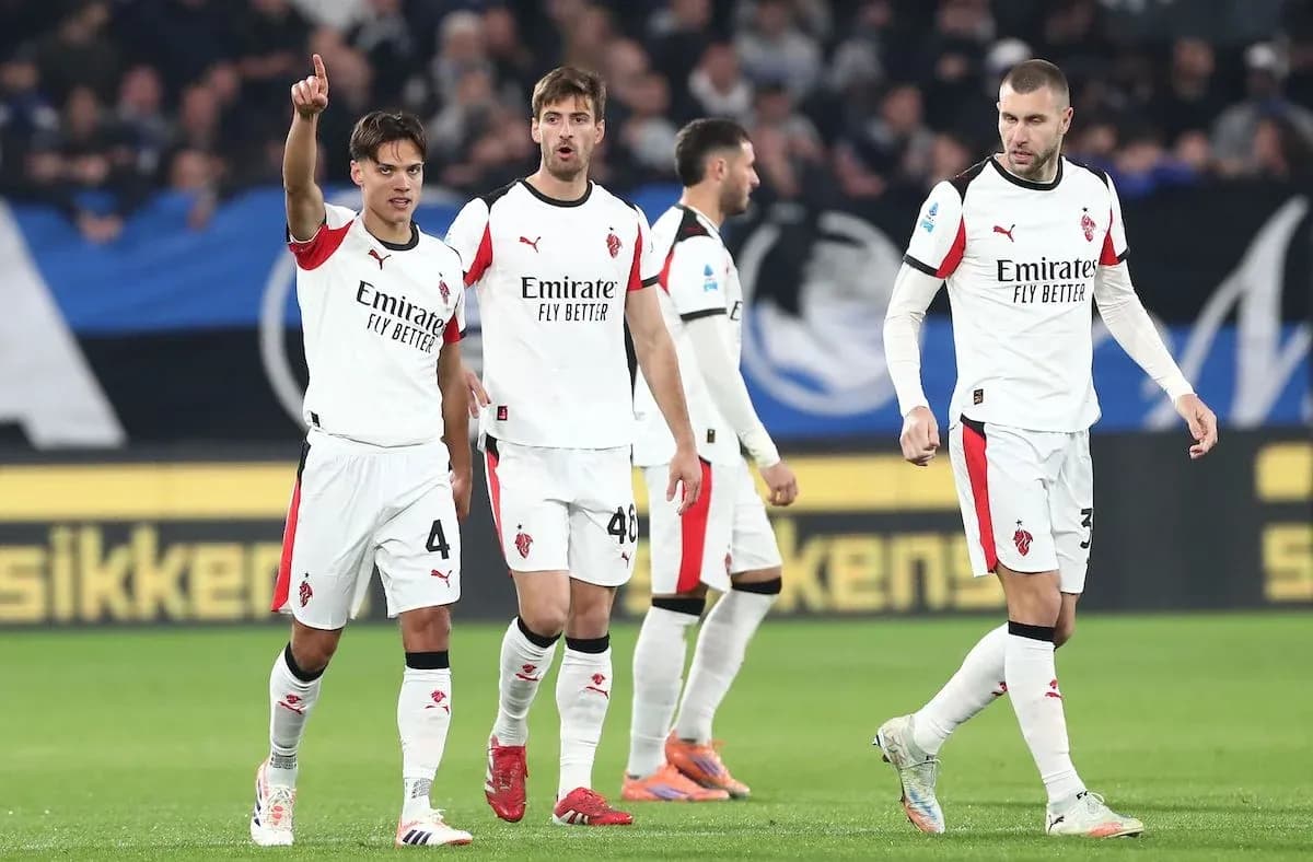 AC Milan players celebrating during a match